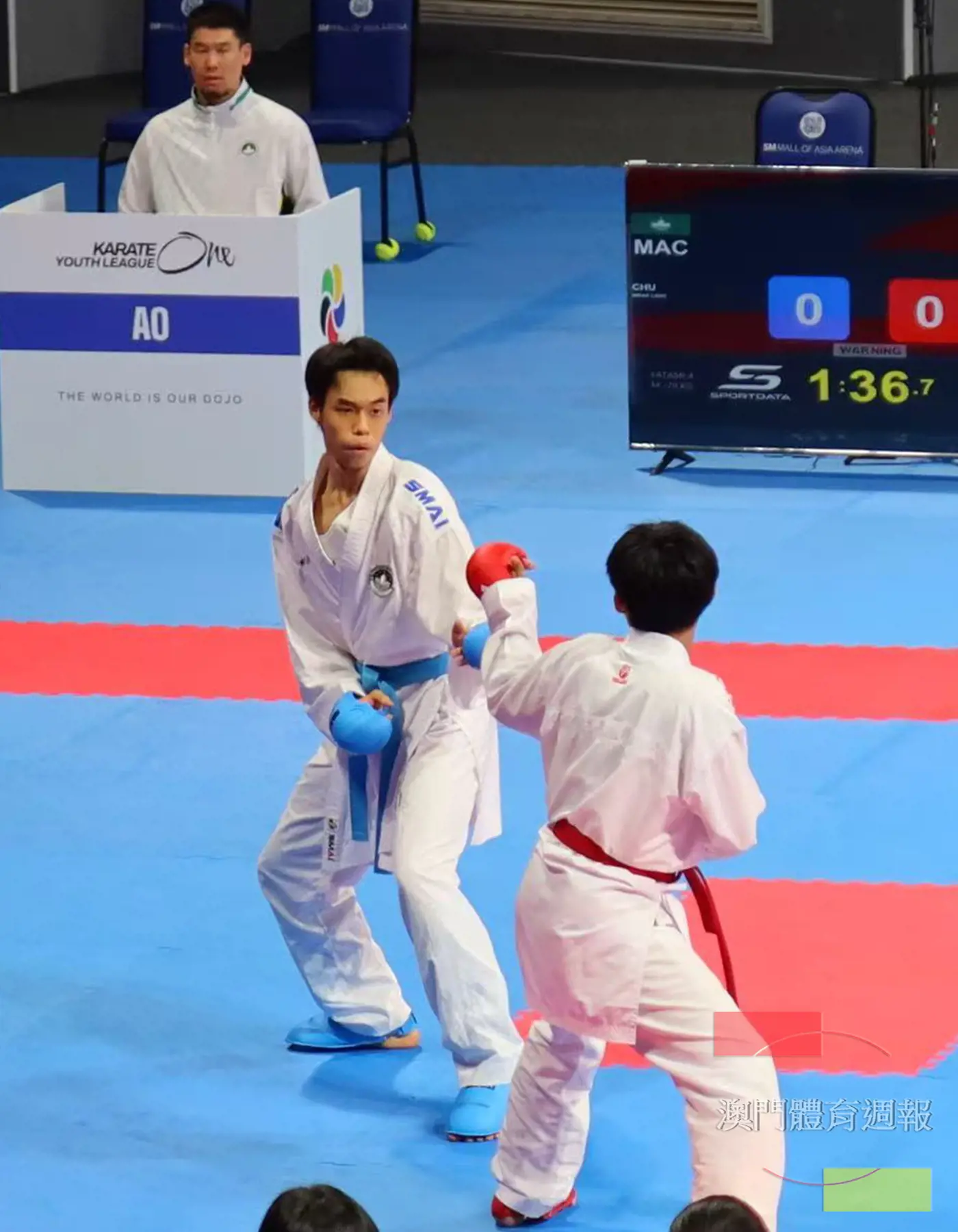 朱泳朗（左）次輪擊敗馬來西亞選手.jpg